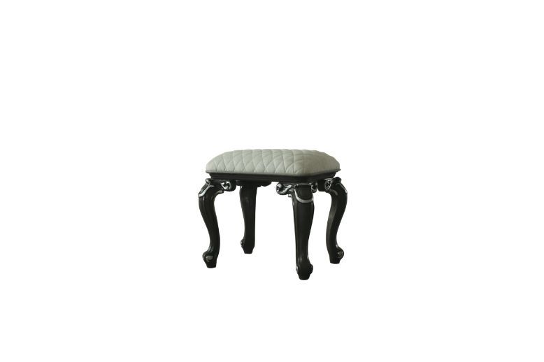 Both decorative and versatile, this delicate stool has a soft seat and elelgant scrolled legs. The mature grey finish all over the wooden frame perfectly coordinates with the clean, white upholstery. Getting extra seating while adding a little classic cha