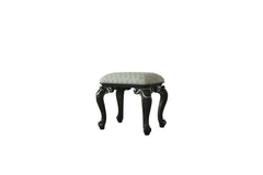 Both decorative and versatile, this delicate stool has a soft seat and elelgant scrolled legs. The mature grey finish all over the wooden frame perfectly coordinates with the clean, white upholstery. Getting extra seating while adding a little classic cha
