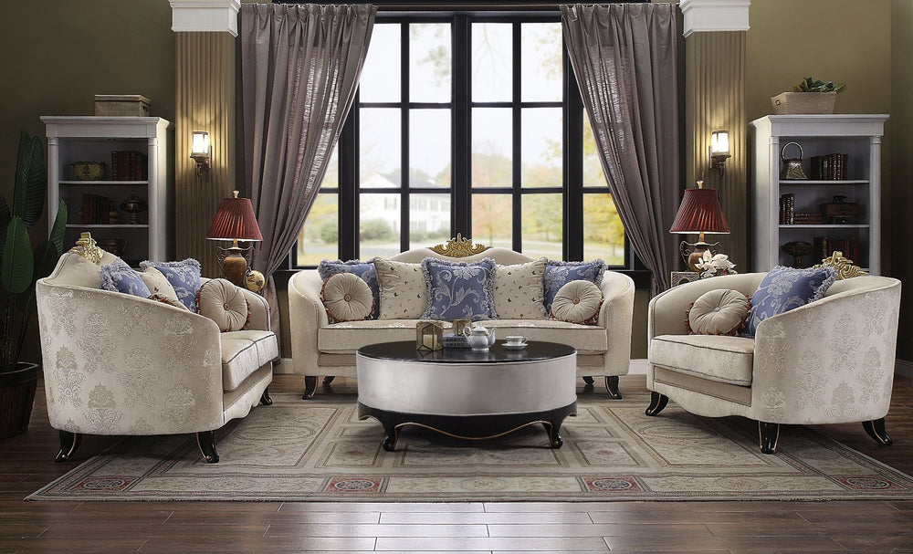 The Sheridan sofa is defined by comfort and style. This beautiful sofa features a solid wood molding crown with a tight back and loose seat cushions in classic cream fabric upholstery. Each piece of this sophisticated living room set boasts of elegantly a