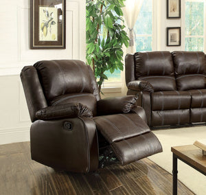 The Zuriel reclining sofa collection is a wonderful choice for any family room, combines luxurious faux leather with the comfort of padded, reclining seating. Comfortable contoured seats, soft to the touch while the reclining footrests offer full leg supp
