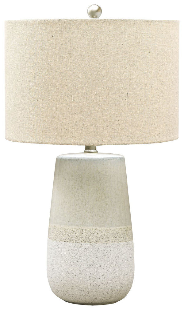 With a textured neutral glaze, this monochromatic table lamp brings thoughts of sun, surf and sand to your space. Turn coastal chic to the contemporary side with this transitional lamp.<br><br><b>Additional Dimensions</b><br><ul><li>Cord length: 96-"</li>