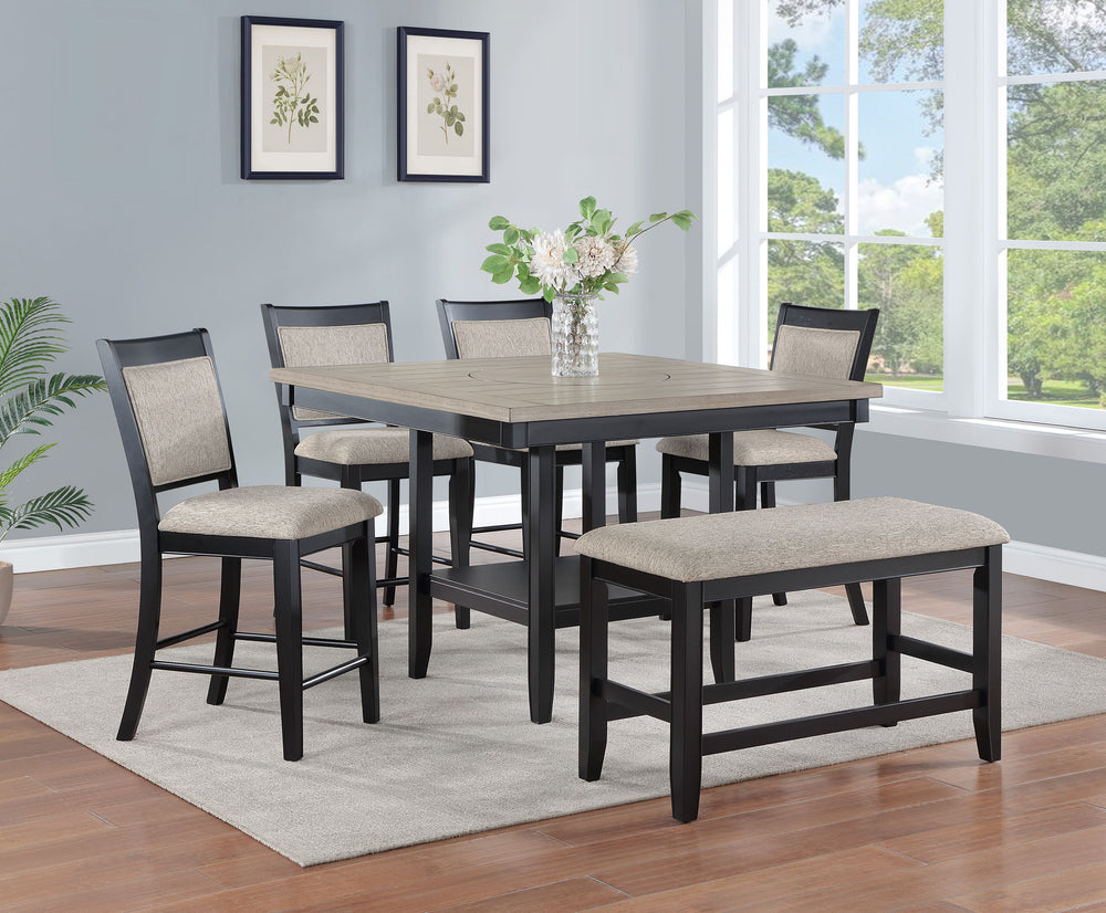 Introduce a touch of contemporary sophistication to your dining area with this stunning counter height dining set. The centerpiece table boasts a chic, two-tone finish with a sleek, dark base and a beautifully textured gray tabletop with built-in turntabl