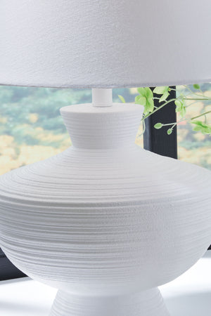  the piece is a striking addition to a sofa-side or entryway table.<b