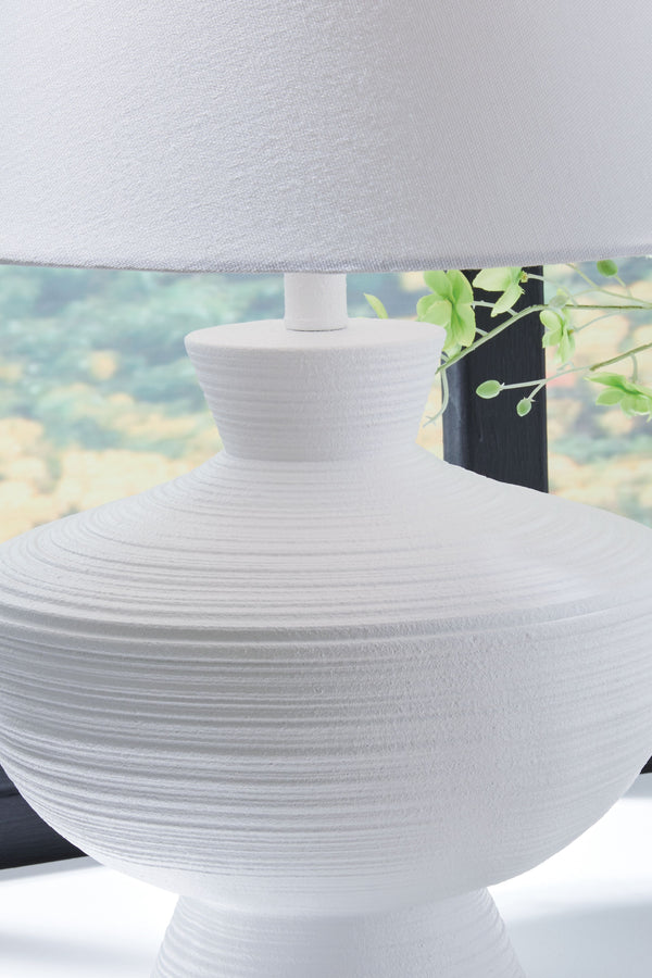  the piece is a striking addition to a sofa-side or entryway table.<b
