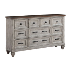 The Mariana 9-Drawer Dresser is a masterpiece of timeless craftsmanship and versatile design, making it a stunning addition to any bedroom. Skillfully crafted from solid Acacia wood and Acacia veneers, this dresser features a rich, hand-distressed Vintage