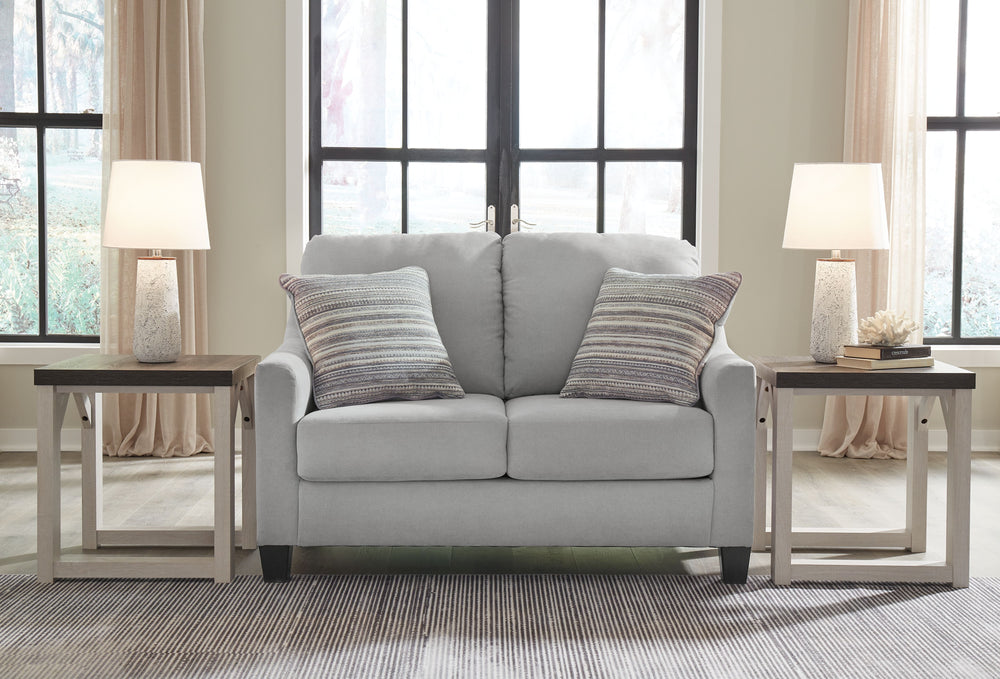 Simply chic comfort. This loveseatâ€™s versatile character is instantly at home where you are, whether your space is casual or contemporary. With the look of suede velvet, you get the ultra-clean, tailored look you love. Howâ€™s that for refined relaxatio