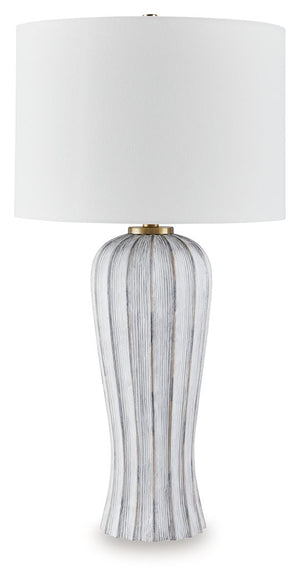 Classic sophistication meets modern sensibility. The gracefully fluted base of this table lamp brings a dynamic feel to the white shade-'s crisp look. Finished in a versatile antiqued gray, the transitional piece effortlessly bridges casual and contempora