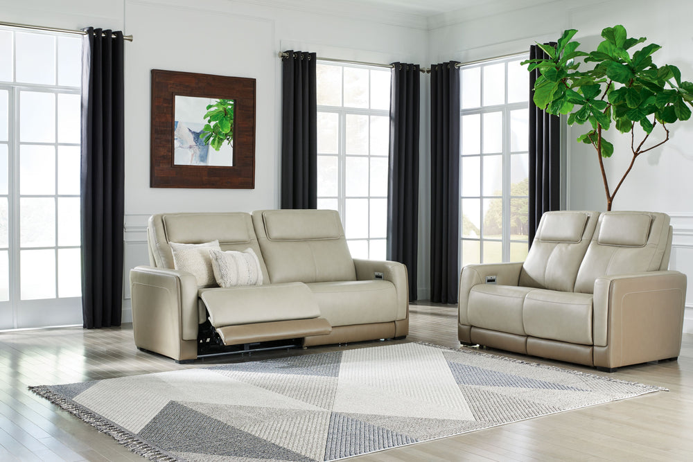 Double down on sleek style with this power reclining sofa and loveseat. It has a streamlined, space-conscious appeal, with two-tone upholstery in neutral hues creating subtly striking visual intrigue. And with one-touch reclining, adjustable headrests and