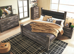 Rustic gray planked replicated oak grain with authentic touch. Large scaled dark colored hooded pull. Sticks across headboard give a thick planked look. Side roller glides for smooth operating drawers. Cases feature a framed front and pilasters. Large dra