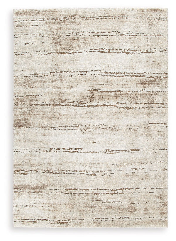 Add a modern touch with this shag rug. Its warm neutral shades and high pile offer a super-soft feel while bringing texture to high-traffic areas. Experience cosmopolitan comfort as you sink your toes into pure luxury.<br/><br/><b>Product Features</b><ul>