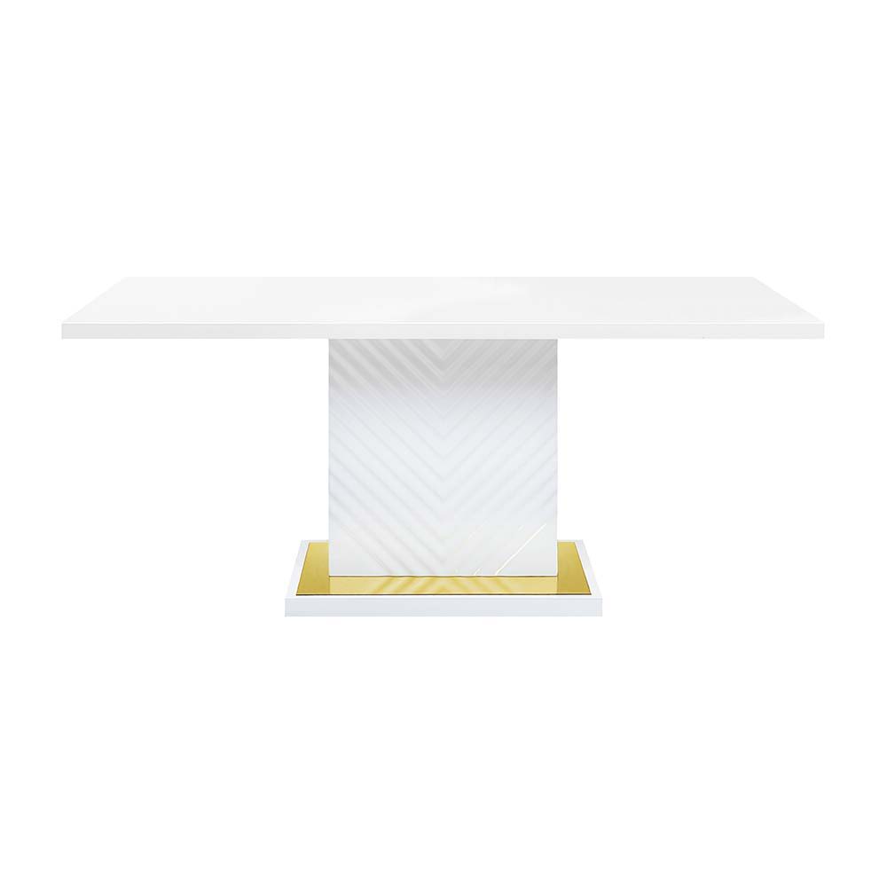 The sleek clean-lined table Gaines dining table offers subtle a hint of glam, the base offers a touch of gold to enhance the textured vertical lined pedestal. The white high gloss finish reflects light and makes any dining space appear larger and grander.