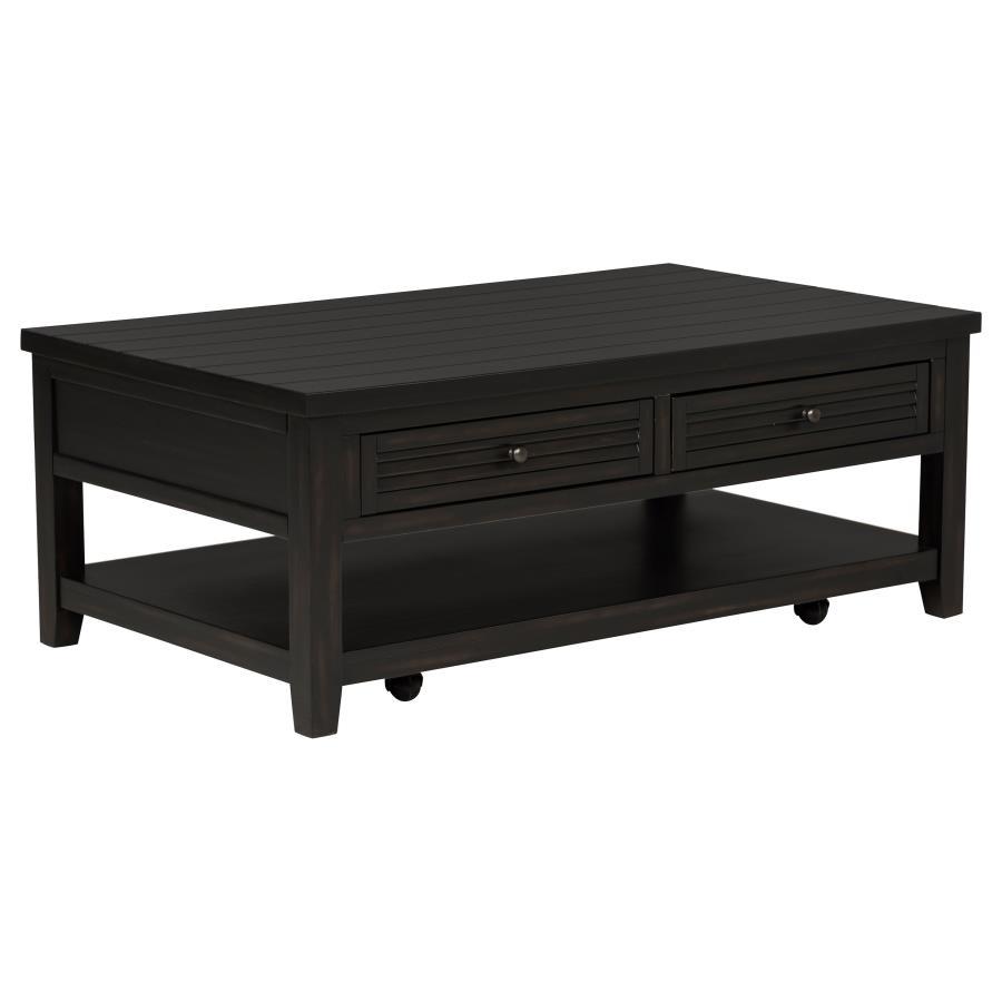 Bring a touch of timeless charm to your living room with this versatile coffee table. Featuring solid wood legs and a beautiful engineered wood frame with a distressed java finish over pine veneer, it offers both durability and style. The planked wood top