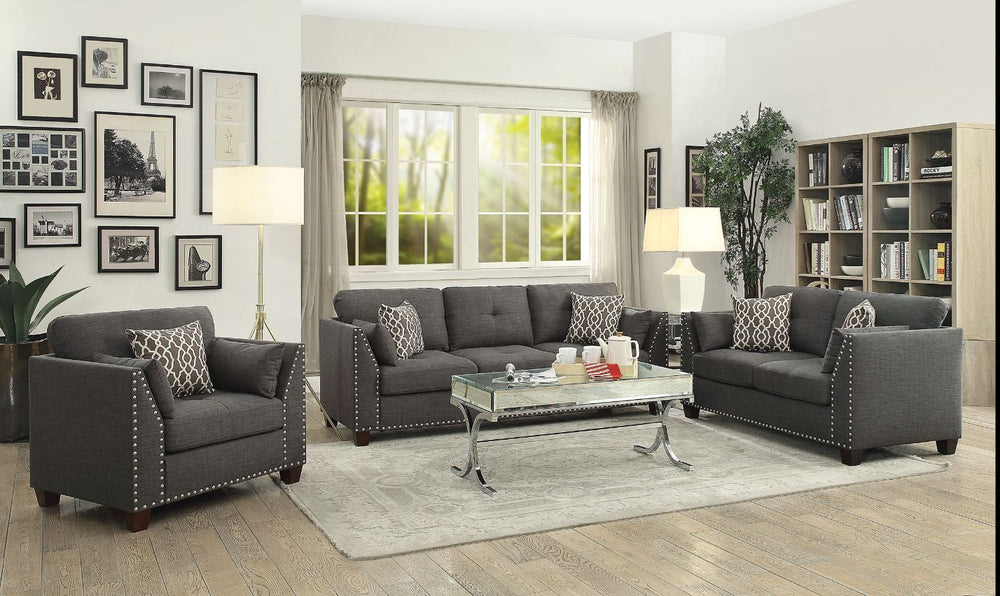 Makes a chic addition to your living room or office. This Laurissa Nailhead sofa group features tufted button on the cushion, clean lines with a well-padded seat and back. Fully upholstered with finely threaded linen and constructed with solid wood, this 