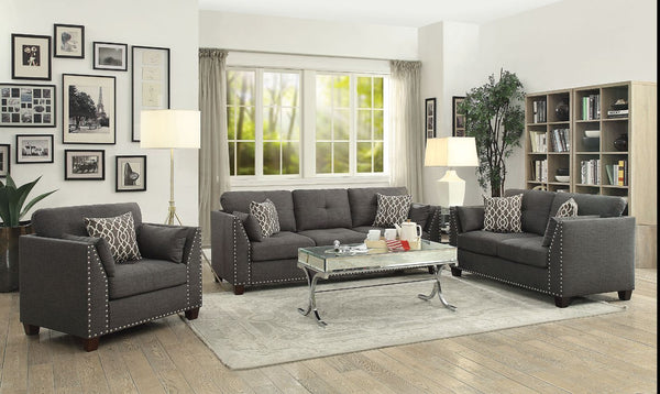 Makes a chic addition to your living room or office. This Laurissa Nailhead sofa group features tufted button on the cushion, clean lines with a well-padded seat and back. Fully upholstered with finely threaded linen and constructed with solid wood, this 