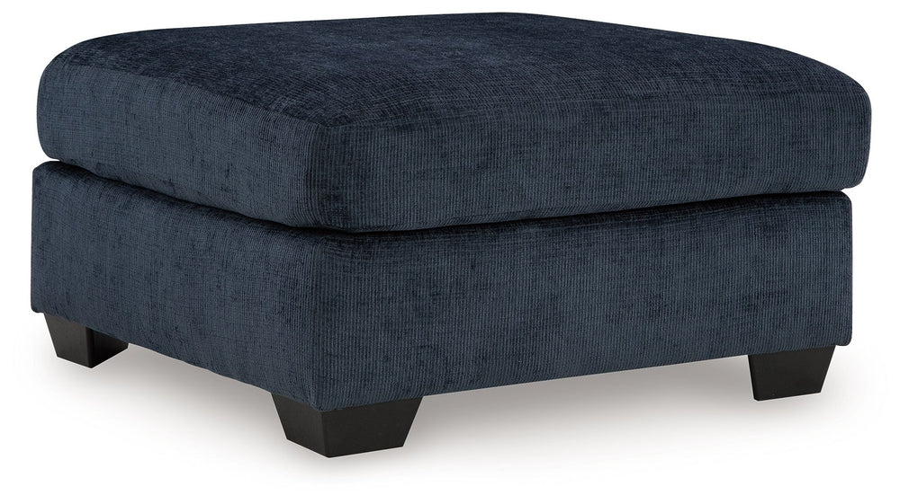 Looking to make a bold statement with color? Liven up your living room with this oversized ottoman. Its trend-right navy blue upholstery adds a playful pop of color to your decor. Pairing posh style with everyday comfort, this piece is a welcome addition 