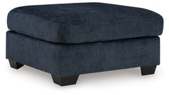 Looking to make a bold statement with color? Liven up your living room with this oversized ottoman. Its trend-right navy blue upholstery adds a playful pop of color to your decor. Pairing posh style with everyday comfort, this piece is a welcome addition 