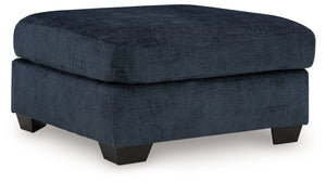 Looking to make a bold statement with color? Liven up your living room with this oversized ottoman. Its trend-right navy blue upholstery adds a playful pop of color to your decor. Pairing posh style with everyday comfort, this piece is a welcome addition 