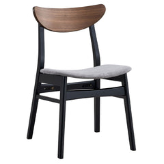 Rebi with its harmonious blend of walnut and black finishes, brings a contemporary touch to any dining space. The walnut table top offers a warm, inviting feel, while the black legs provide a modern contrast. Perfect for family dinners or entertaining gue