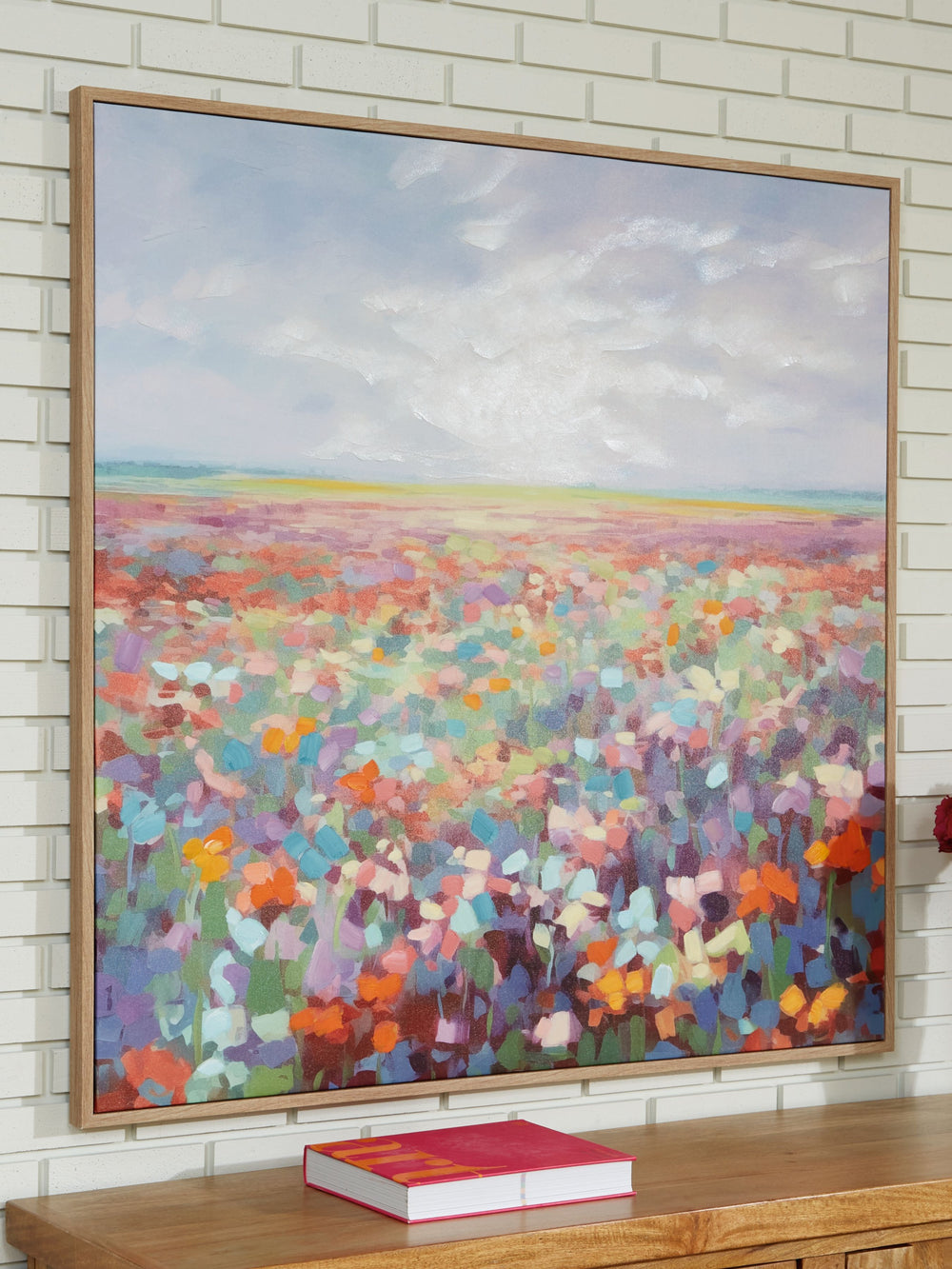 Get lost in a field of florals. The bright, beautiful hues of this wall art inspire joy as they immerse you in this landscape design. What a breathtaking way to transform your wall decor from black and white to technicolor.<br/><br/><b>Product Features</b