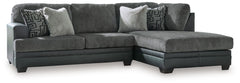 Appeal to your eye for ultra-contemporary design with this sectional. Chic and sleek in dark neutrals, it pairs cozy fabric with faux leather for invitingly cool character. And with a roomy chaise offering extra seating space, family and friends can chill