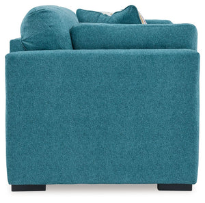  it adds a fashion-forward pop of color to your living room. Velvet-like upholstery and matching bolster pillows keep comfort at to