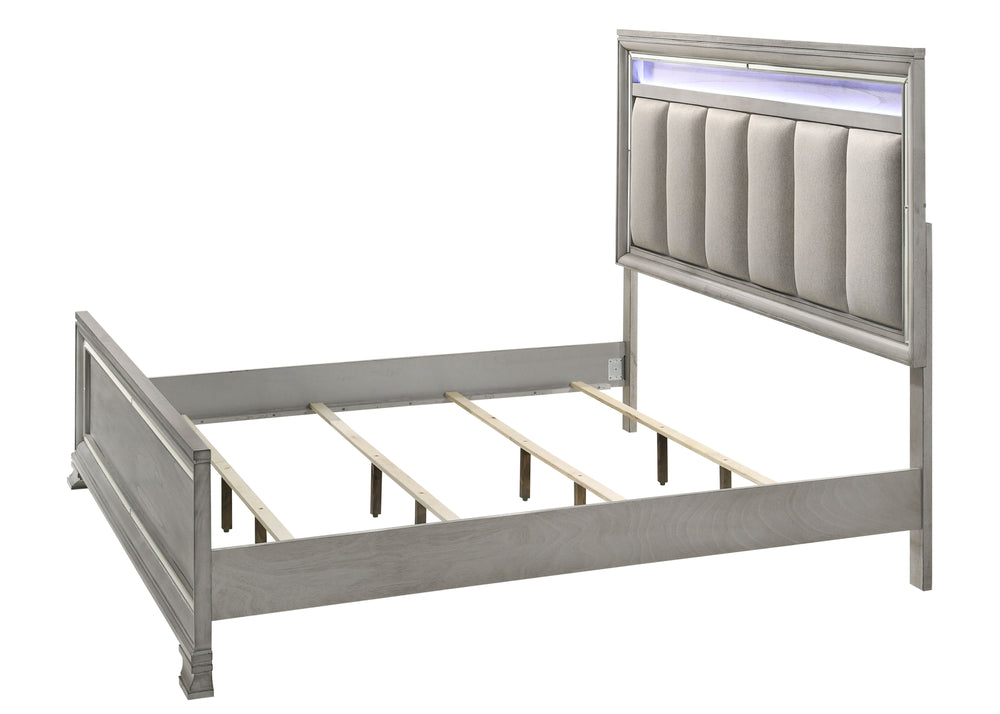 This elegant bedroom suite combines timeless design with contemporary appeal. The soft gray finish offers a modern twist on classic styling, with integrated LED lighting on the tufted headboard adding a luxurious focal point. The collection includes a bed