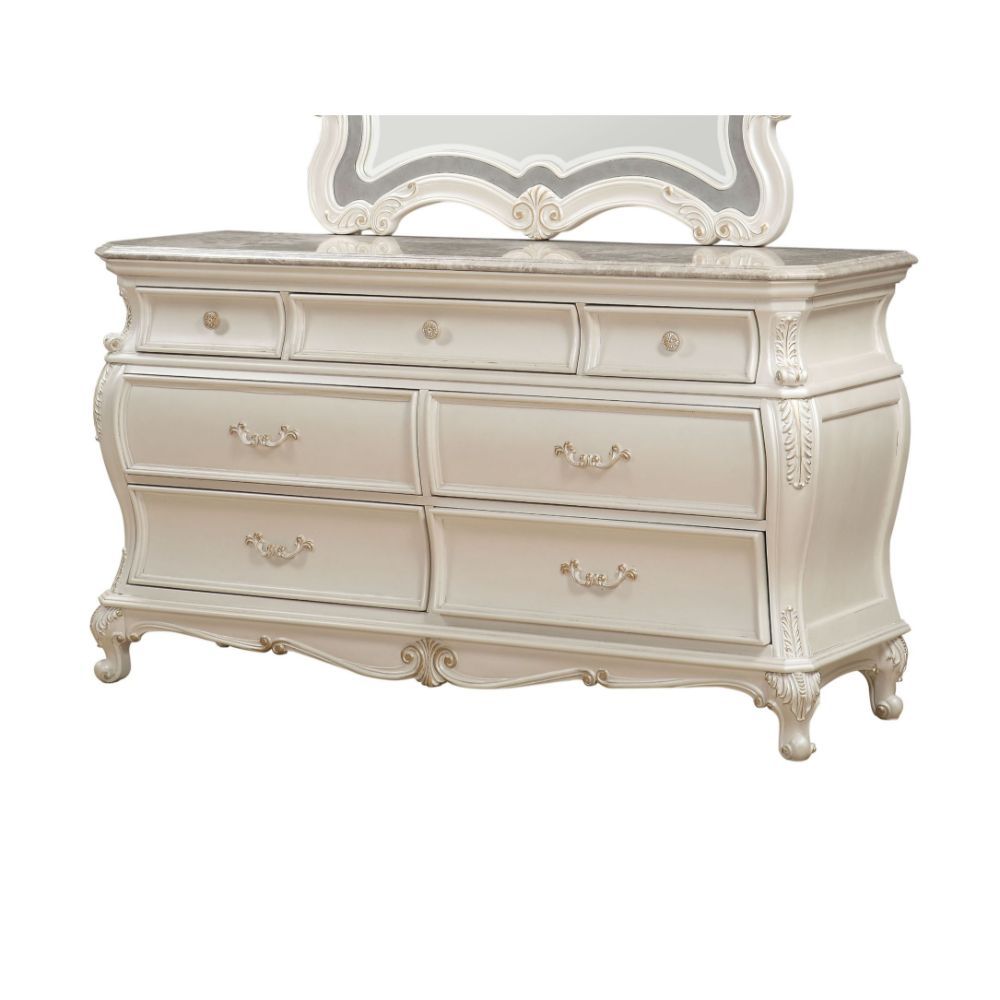 The Chantelle Dresser with Granite Top features seven felt-lined pull-out drawers with delicate drop handles and an antique platinum finish. The 1st Avenue collection strives to create a warm and comfortable environment in every home without sacrificing s