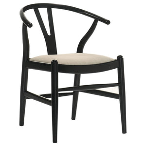  these chairs add an exotic feel in sculptured shaping and charming tapered legs