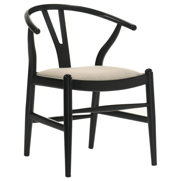  these chairs add an exotic feel in sculptured shaping and charming tapered legs