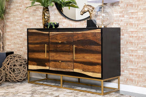  this piece flaunts a range of natural wood colors. Two cabinet drawers boast sleek gold bar pulls. Meanwhile