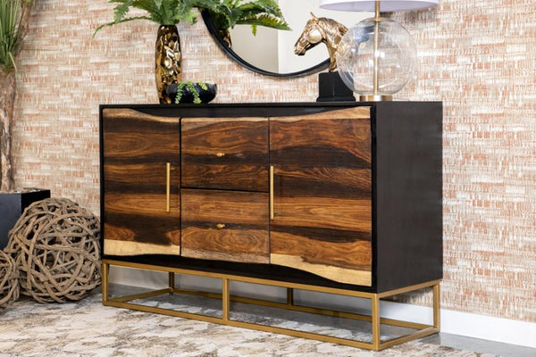  this piece flaunts a range of natural wood colors. Two cabinet drawers boast sleek gold bar pulls. Meanwhile