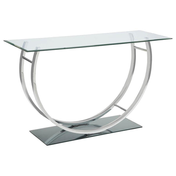 This modern rectangular console table showcases a clear tempered glass top paired with a sleek mirrored base, creating a polished, contemporary appeal. The curved frame, crafted from heavy gauge electroplated chrome metal, adds a touch of sophistication a