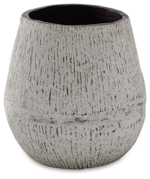 Elevate your home-'s artful appeal with this vase. Its distressed paper composite features a textural aesthetic that gives it mounds of character. Filled with artificial/dried flowers or left unadorned, what a tasteful addition to your creatively curated 