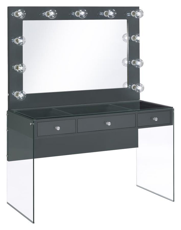 Add a bold, dramatic touch with this modern vanity set. Complete with a smooth, grey high gloss lacquer finish across the tabletop and mirror frame, this vanity matches a variety of color palettes. Supported by clear tempered glass side panels, the vanity
