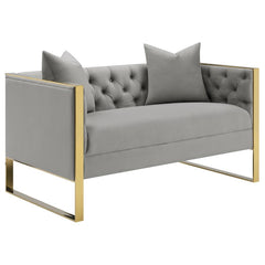 You-'ll love the contrast of tones and materials in this modern two-tone loveseat, but it-'s the cozy comfort that will leave you hooked. The button tufted velvet upholstery comes in an elegant light grey finish that-'s soft to the touch. Two throw pillow