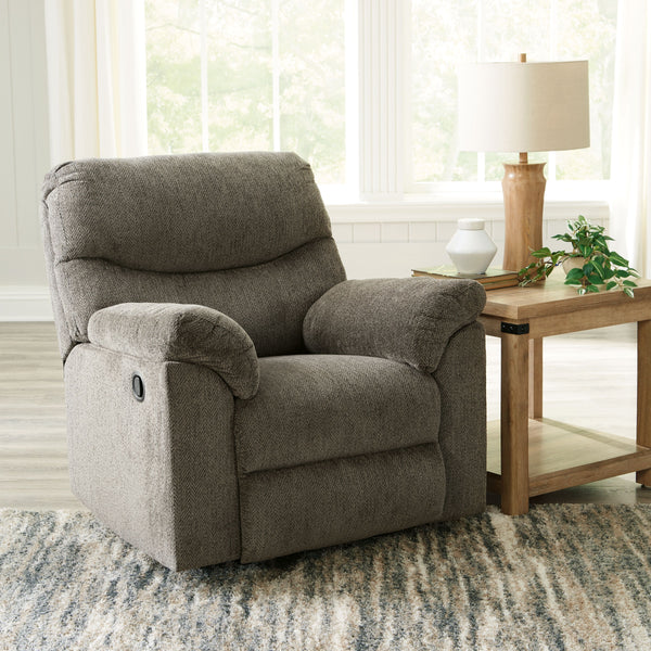  this rocker recliner invites a relaxed sensibility into your space. Its neutral upholstery has a universal appeal