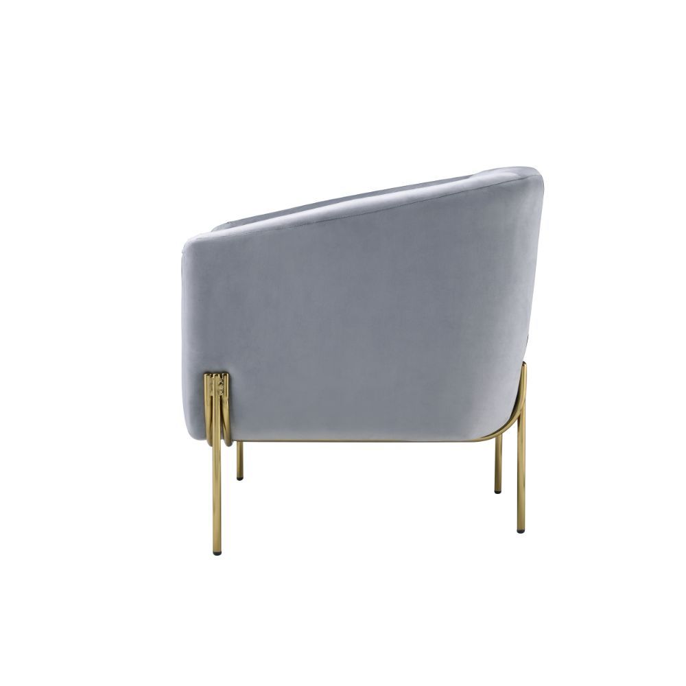 This beautiful Carlson accent chair is the perfect addition to any contemporary home. Its luxurious velvet fabric and comfortable barrel backrest add sophistication to any room. Featuring elegant gold legs and high-shelter armrests that will make you feel