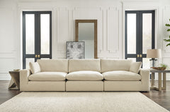 Down with uptown style. This sectional goes to town with a high-design aesthetic, sleek sophistication and sumptuous comfort that are temptingly affordable. Wide track arms, softened by plush side pillows, offer a welcoming look and feel, while back pillo