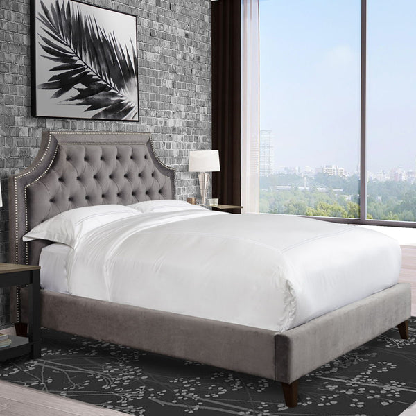 A true dream come true, this luxurious upholstered bed is a statement-maker in every way. Worthy of being the focal point of the bedroom, it creates a high-end look with classic design elements that will always be in style. Tailored in an exquisite fabric