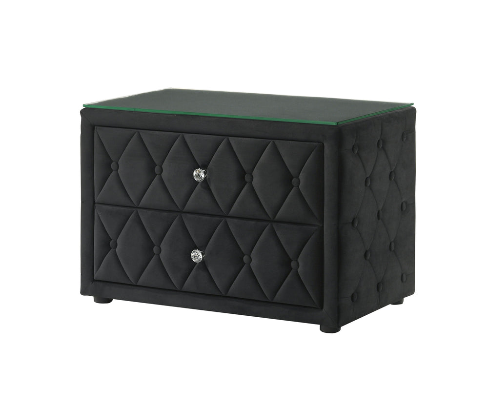 This stunning nightstand exudes modern sophistication with its luxurious velvet upholstery and elegant diamond-tufted design. The two spacious drawers provide ample storage, while the crystal-like drawer pulls add a touch of glamour. The sleek glass top e