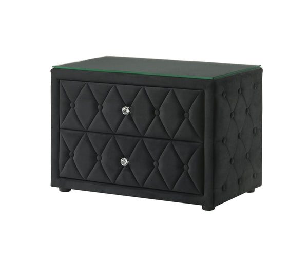 This stunning nightstand exudes modern sophistication with its luxurious velvet upholstery and elegant diamond-tufted design. The two spacious drawers provide ample storage, while the crystal-like drawer pulls add a touch of glamour. The sleek glass top e