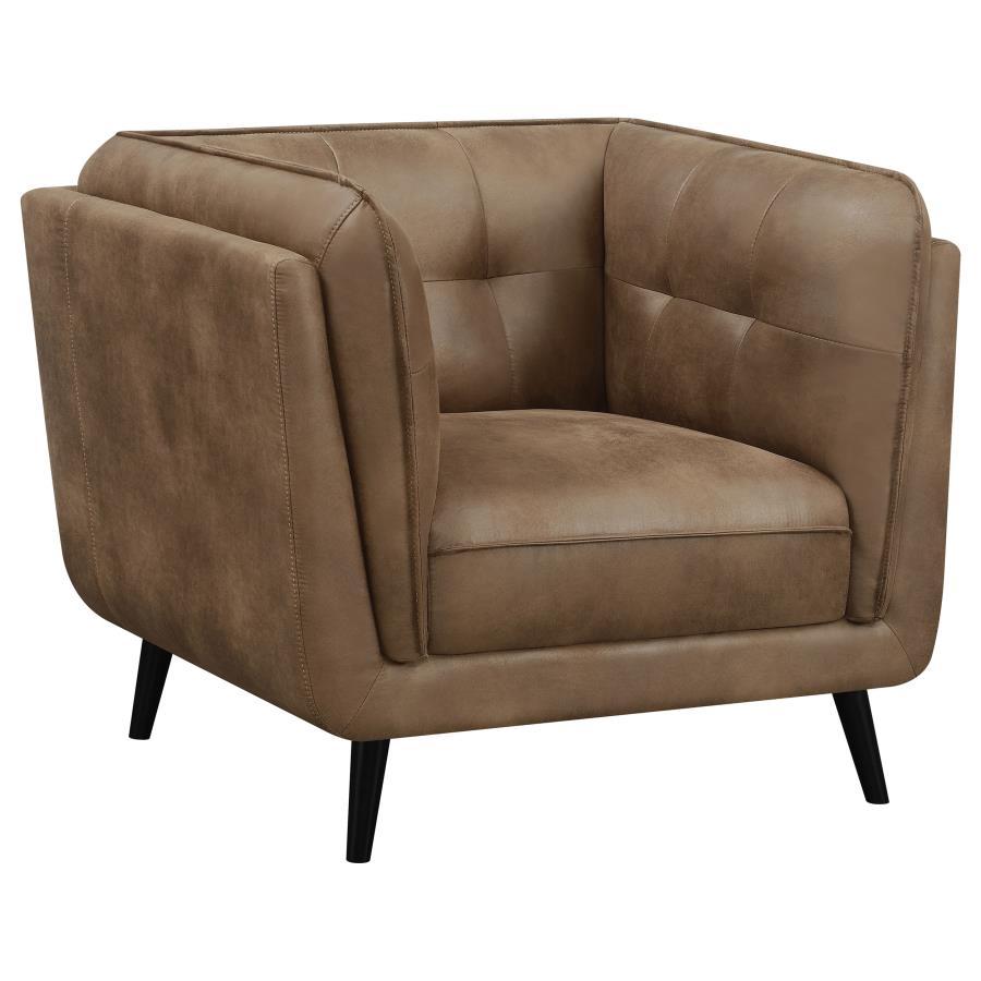 Transform your mid-century modern living room seating area with this contemporary shelter style lounge chair, designed in an updated Chesterfield style complete with plush grid tufted seats and cushions upholstered in a soft and smooth brown microfiber le