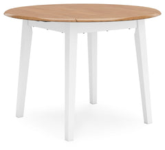 Complement your homeâ€™s simply relaxed sensibility with this drop-leaf dining table. A crisp white hue offers a chic contrast to the natural wood tone, for a neutral look that vibes with a variety of aesthetics. When guests drop by, convert it from a spa