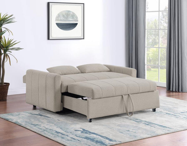  the sofa showcases clean lines and vertical channel tufting
