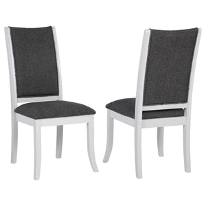 Dimensional gray upholstery creates engaging contrast and depth for this set of two modern dining chairs. Each boasts a tall, refined silhouette that-'s armless to create a smooth, streamlined silhouette. Cushions are padded with foam and covered in dark 