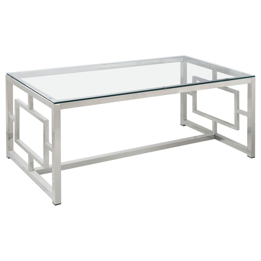 This rectangular coffee table, also known as a cocktail table, brings a sleek modern design to your living room. The clear tempered glass top offers durability and elegance, while the electroplated chrome frame features a polished, reflective finish. Its 