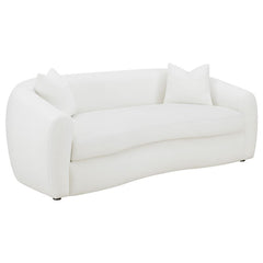 Create your inviting living room with this contemporary natural sofa, upholstered in boucle upholstery throughout its gracefully designed, contoured silhouette and elegantly sloped armrests. Matching accent pillows with premium faux down fill offer extra 