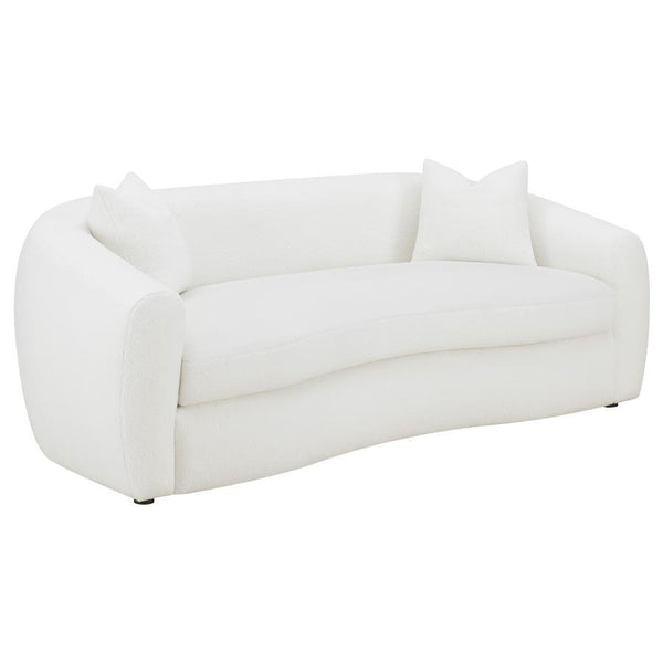 Create your inviting living room with this contemporary natural sofa, upholstered in boucle upholstery throughout its gracefully designed, contoured silhouette and elegantly sloped armrests. Matching accent pillows with premium faux down fill offer extra 