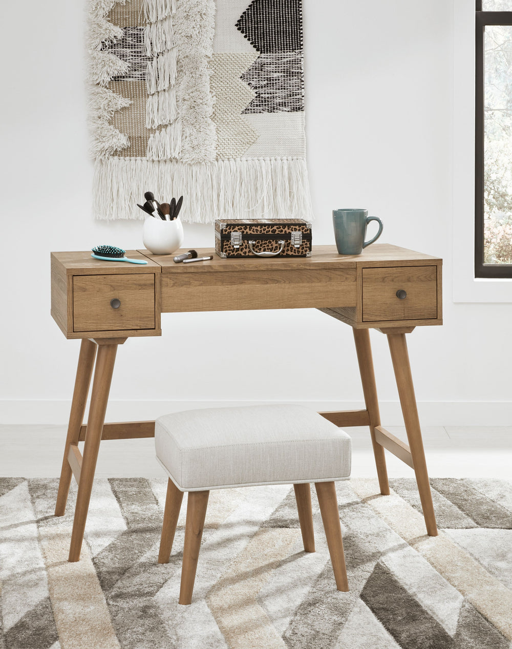 Whether in a teenâ€™s room, master bedroom or dressing area, the mid-century inspired design of this vanity set in light brown is packed with possibilities. The flip-top design makes it doubly handy as a vanity or writing table