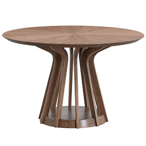 Adorned with a sophisticated walnut finish brings a touch of elegance to any dining room. Its round design fosters intimate conversations, making every meal a cherished moment. The smooth, rich wood tones of the table complement its modern aesthetic, whil